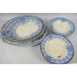 A collection of antique blue and white dinner wares.
