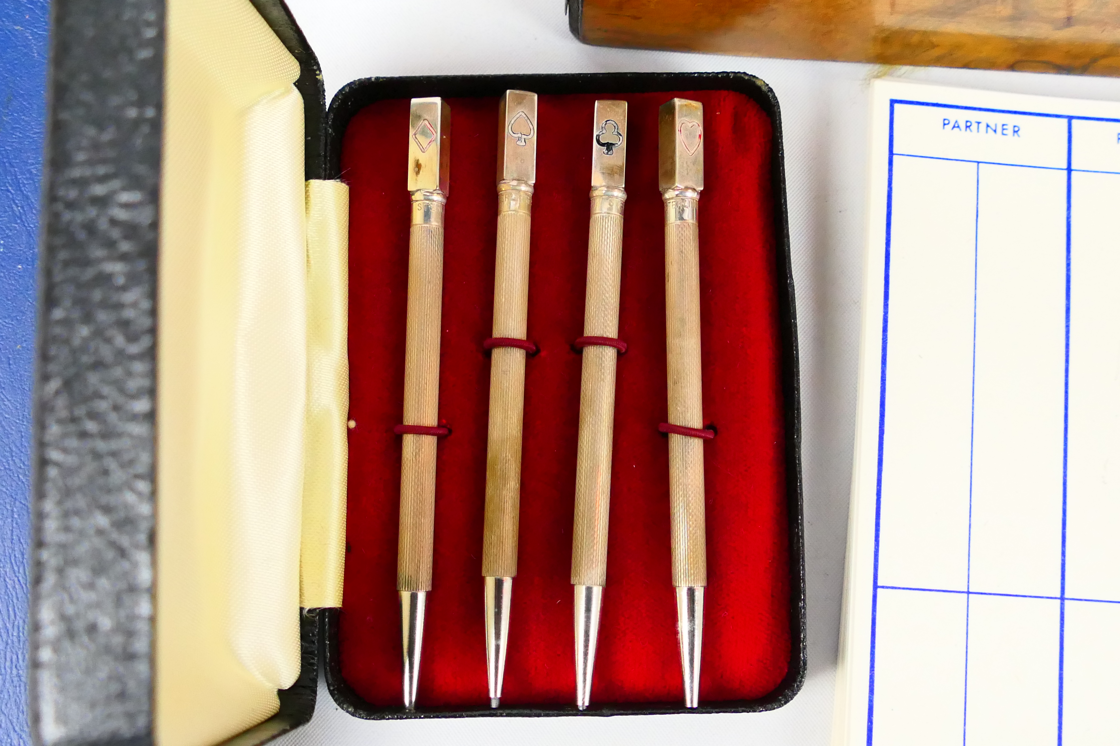 A wooden box containing bridge score cards and similar to include a set of four propelling pencils - Image 3 of 10