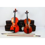 Two cased violins comprising a Stentor Student ST and a Stentor Student Standard,