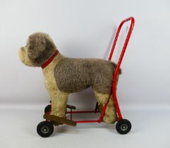 Tri-ang - A vintage 'International Model Aircraft Ltd' Push-A-Long Dog by Tri-ang.