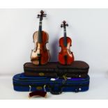 Two violins comprising a Stentor Student ST and a Stentor Student I, contained in carry cases. [2].