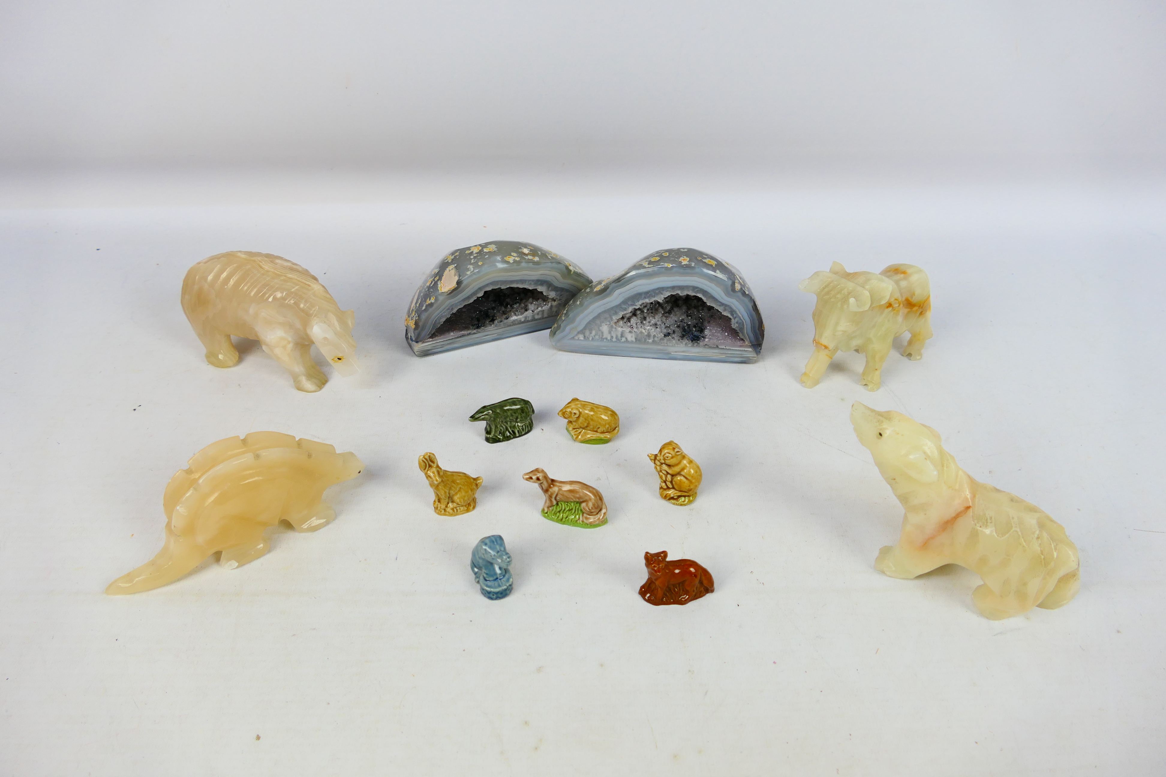 A collectable lot to to include two light blue geode crystals.