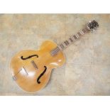 A vintage Hofner archtop Guitar, circa 1960s, with bound F holes,