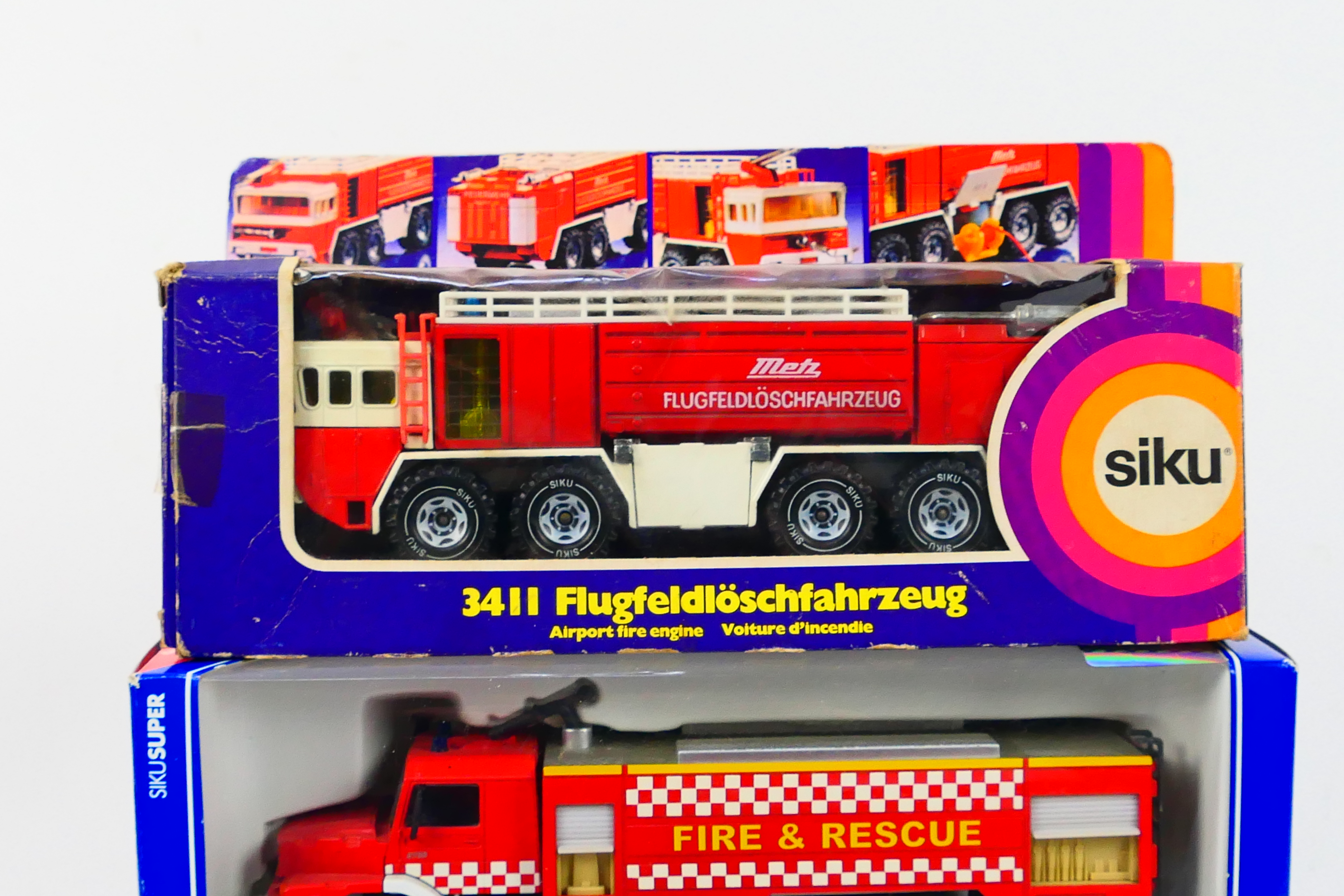 Siku - Three boxed diecast 1;50 scale fire appliances from Siku. - Image 4 of 4