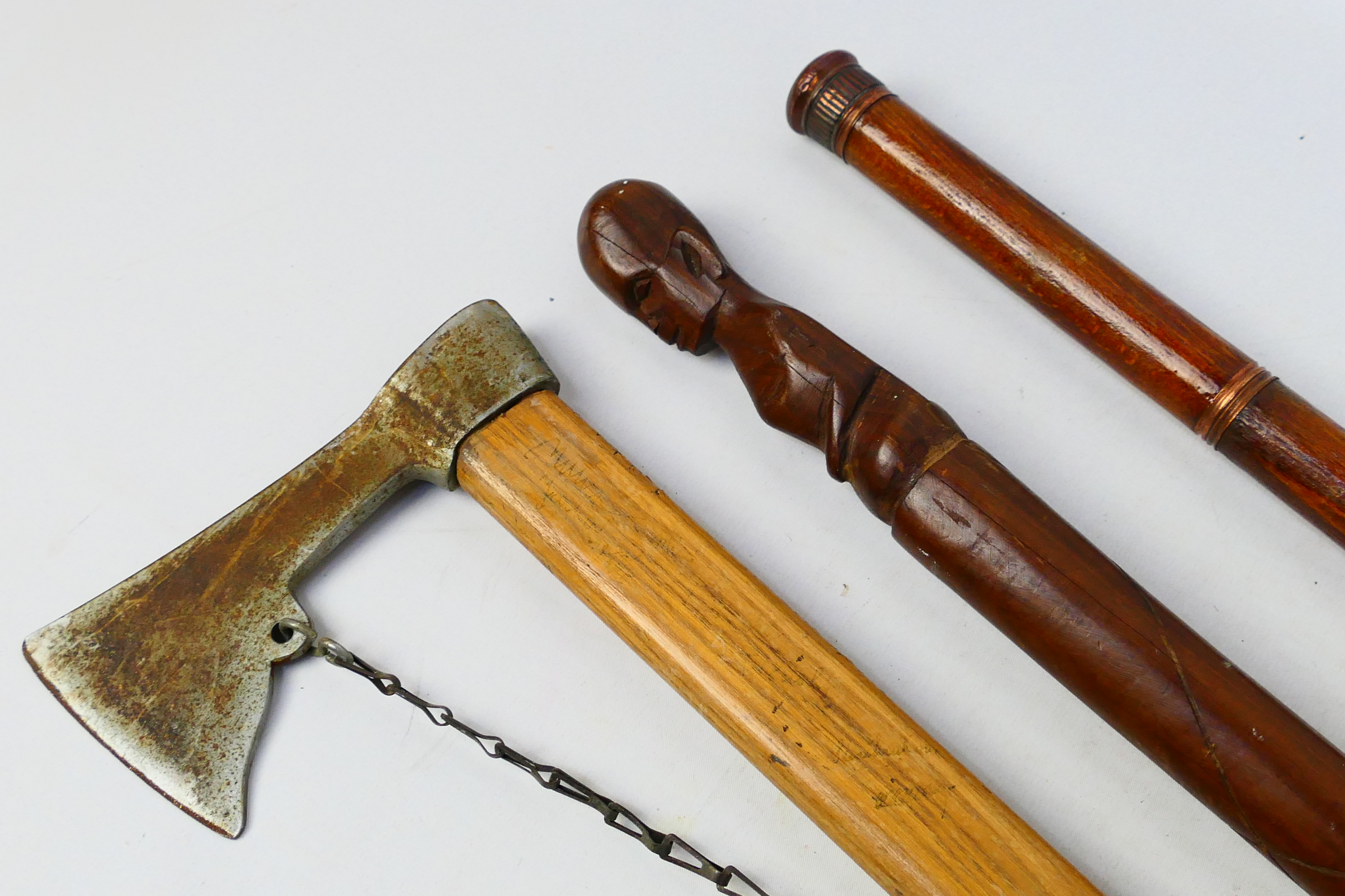 An axe with 79 cm (l) haft, 16 cm head, African tribal stick and a copper mounted walking stick. - Image 2 of 12