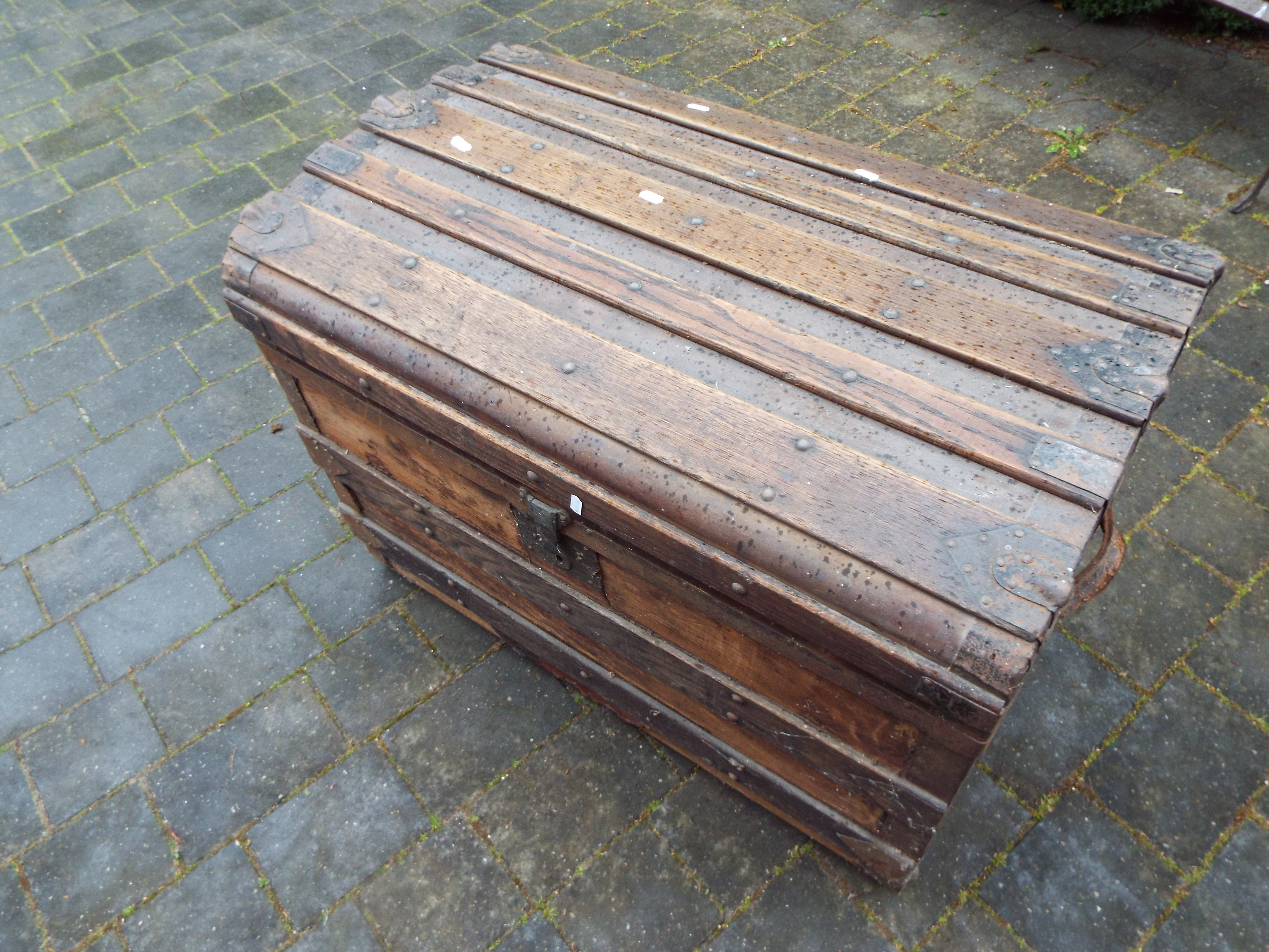 A late 19th/early 20thC domed top trunk with wooden slats, - Image 4 of 5