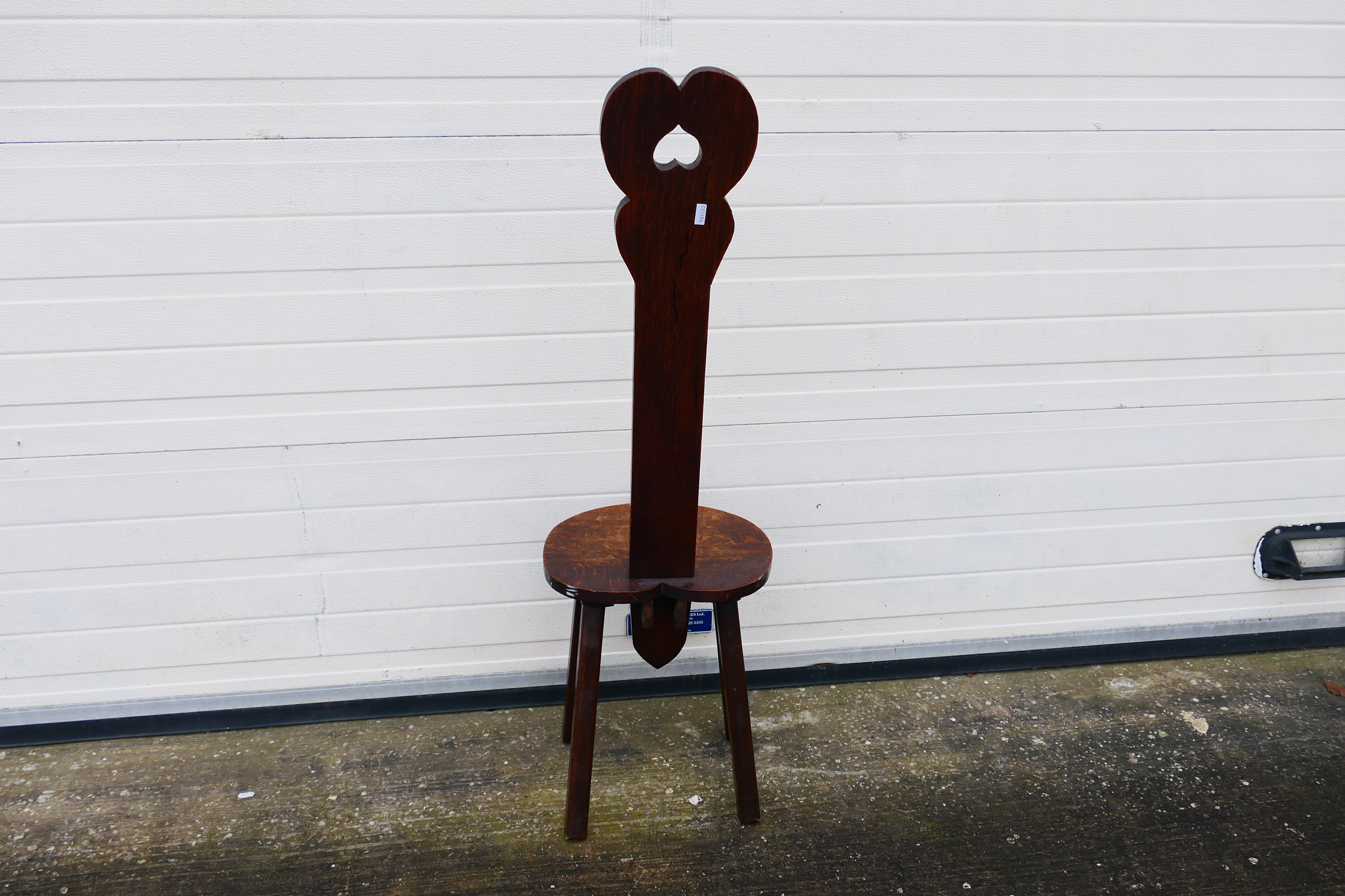 A wooden spinning chair with heart-shaped design. 120 cm (h) x 31 cm (d) x 35 1/2 cm (w). - Image 6 of 6