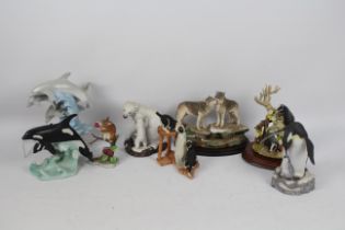 A collection of porcelain and other animal groups to include Sherrat & Simpson, Lenox and other,