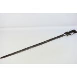 A late 18th or early 19th century North African Nimcha type sword, 93 cm (l) single edged blade,