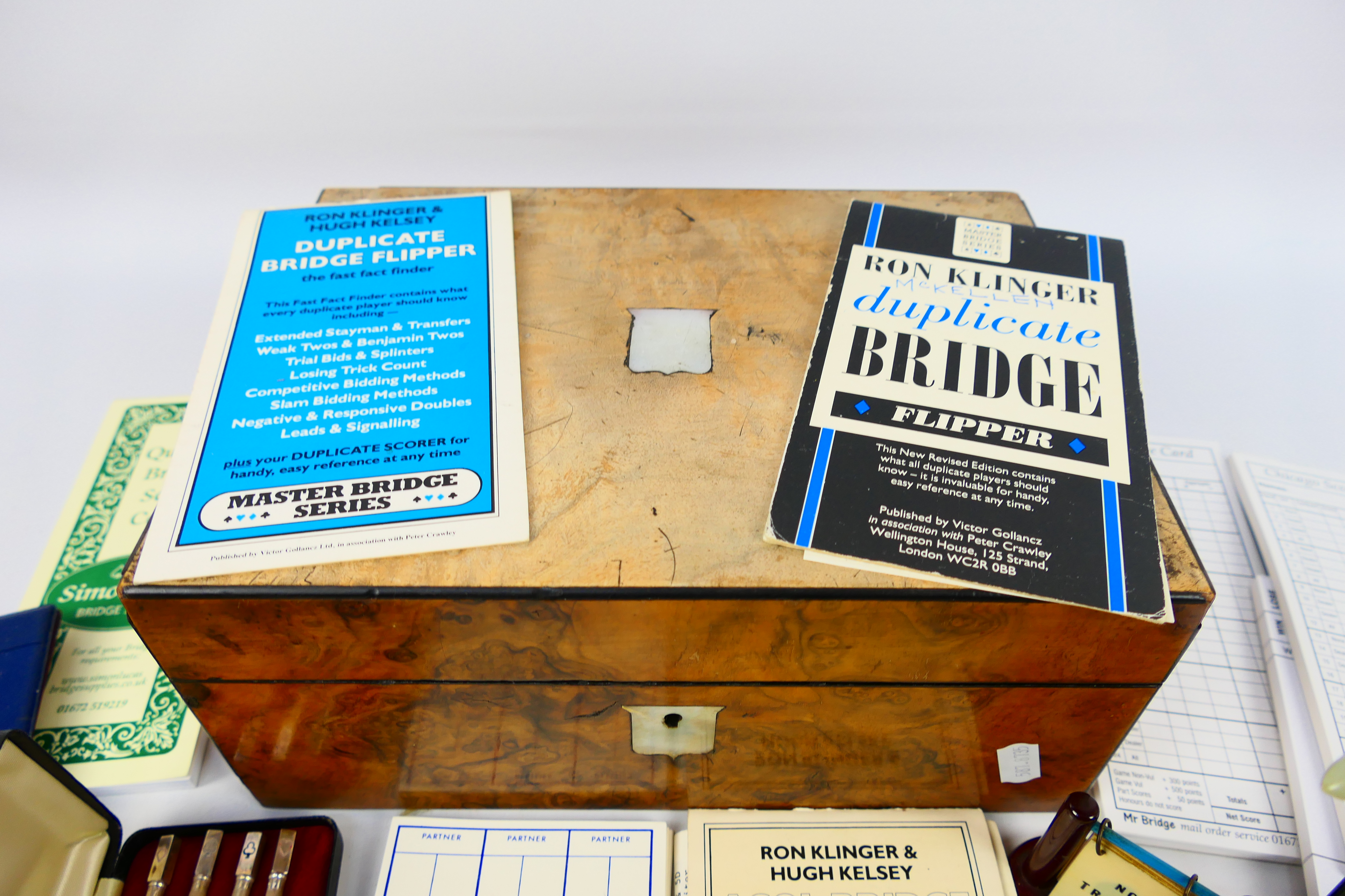 A wooden box containing bridge score cards and similar to include a set of four propelling pencils - Image 2 of 10