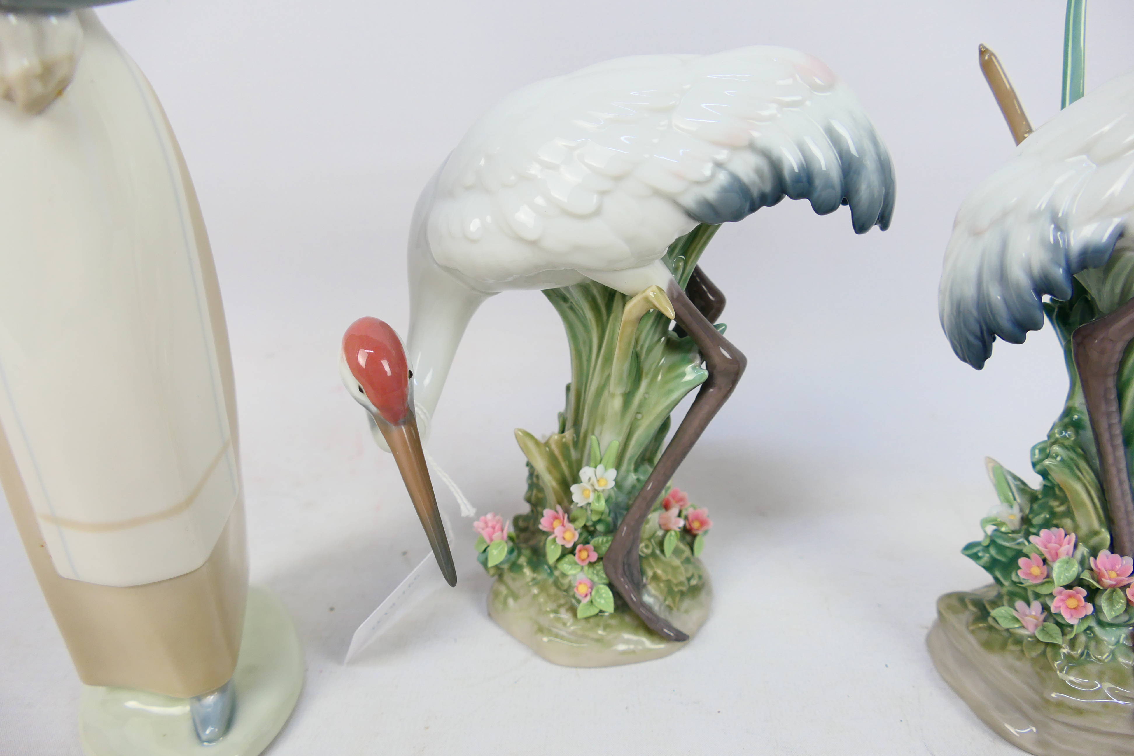 Lladro - Three figures comprising two Red-crowned crane studies and a girl carrying a lamb, - Image 3 of 5