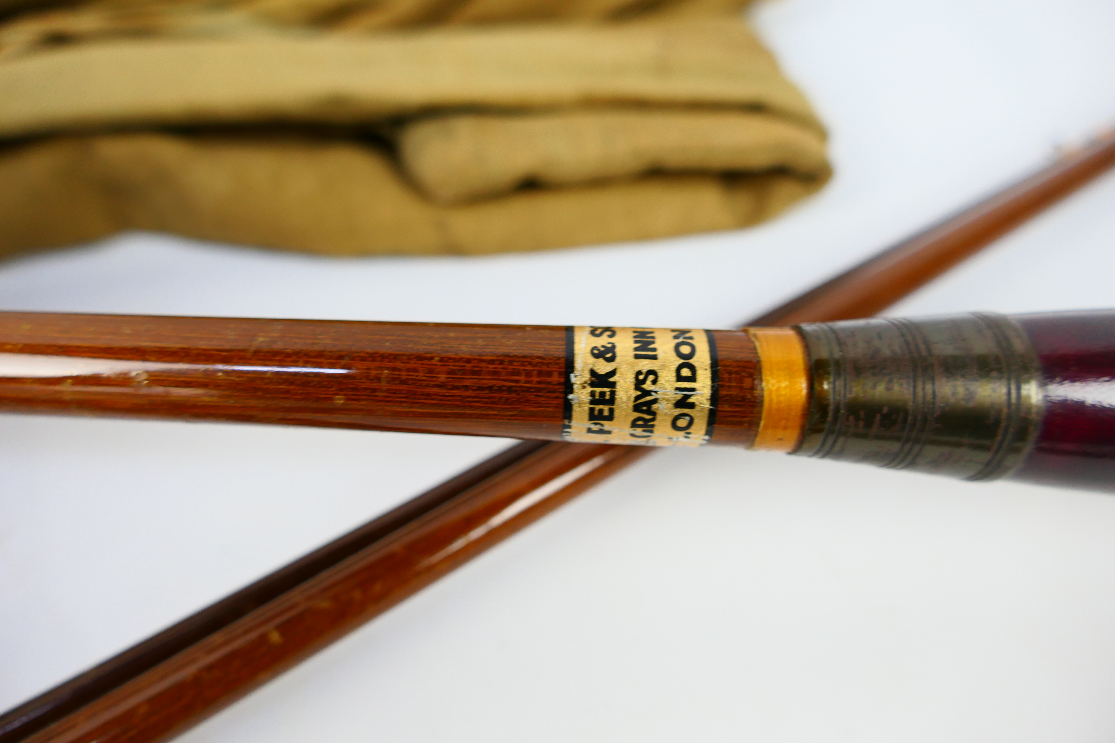 Two J Peek & Son three piece fishing rods contained in canvas bags. - Image 2 of 4