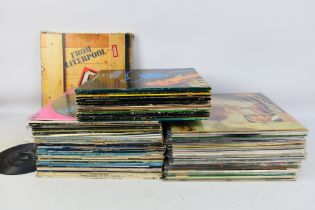 A collection of 12" vinyl records to include ELO, Thin Lizzy, The Animals, Blondie,