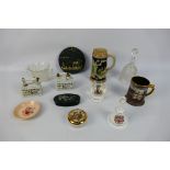 A group of ceramics and glassware. Lot includes an Asian decorative trinket box. A German mug.