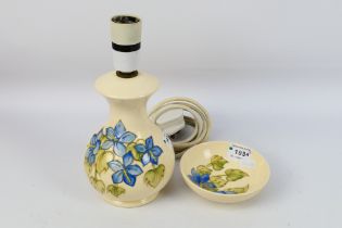 Moorcroft - A Moorcroft Pottery footed bowl decorated in the Campanula pattern and a Campanula
