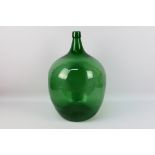 A large green glass carboy, approximately 50 cm (h).