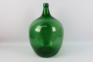 A large green glass carboy, approximately 50 cm (h).