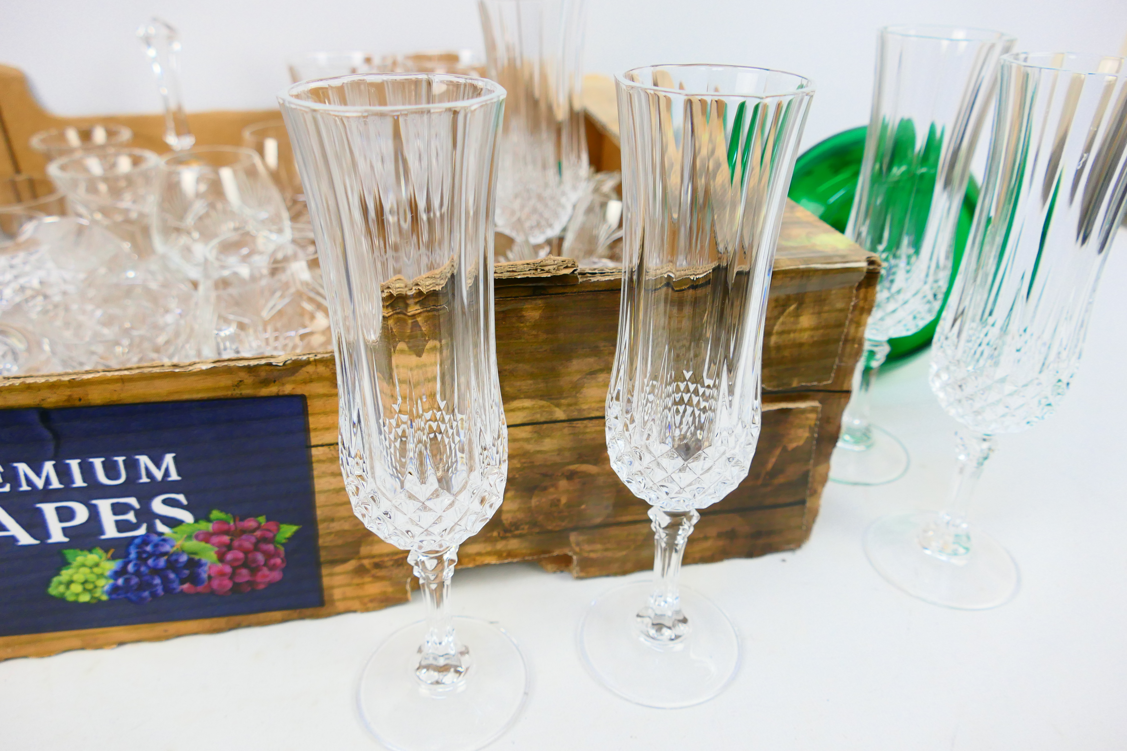 A collection of crystal glassware and a green glass jug with hand painted floral decoration. - Image 2 of 4