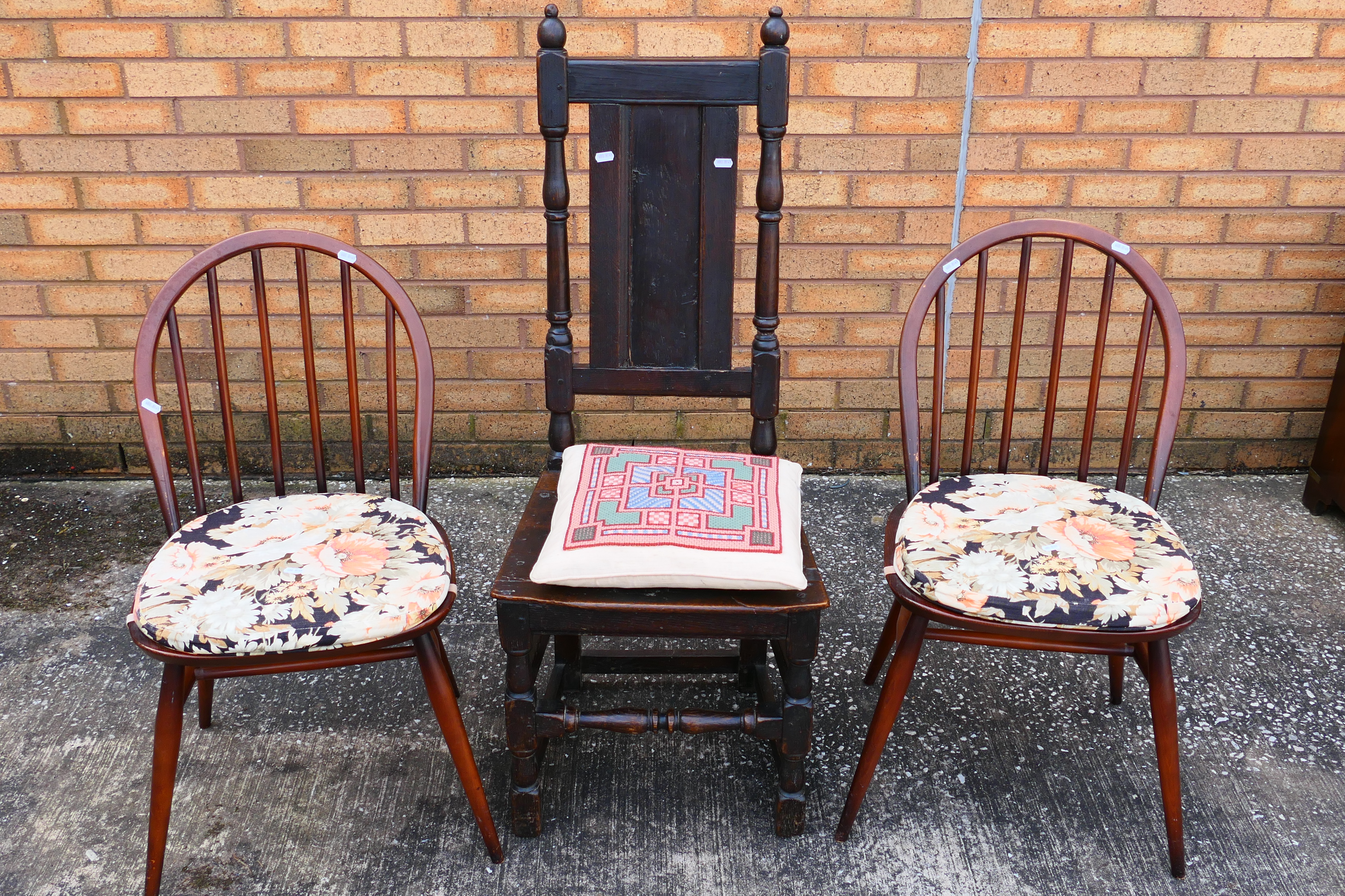 A pair of Ercol Windsor dining chairs and an antique oak side chair. [3].