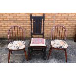 A pair of Ercol Windsor dining chairs and an antique oak side chair. [3].