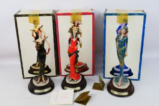 Three boxed Leonardo Collection figures from the High Society series, approximately 29 cm (h). [3].