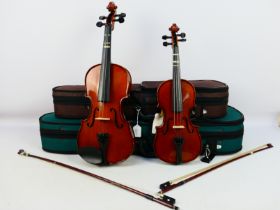 Two cased violins comprising two Stentor Student ST, both with bows and contained in carry cases.
