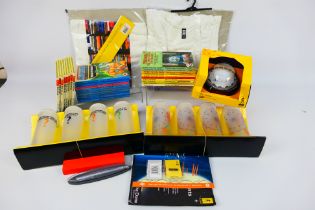 A quantity of Millennium Dome collectable items to include T Shirts, die-cast replica,
