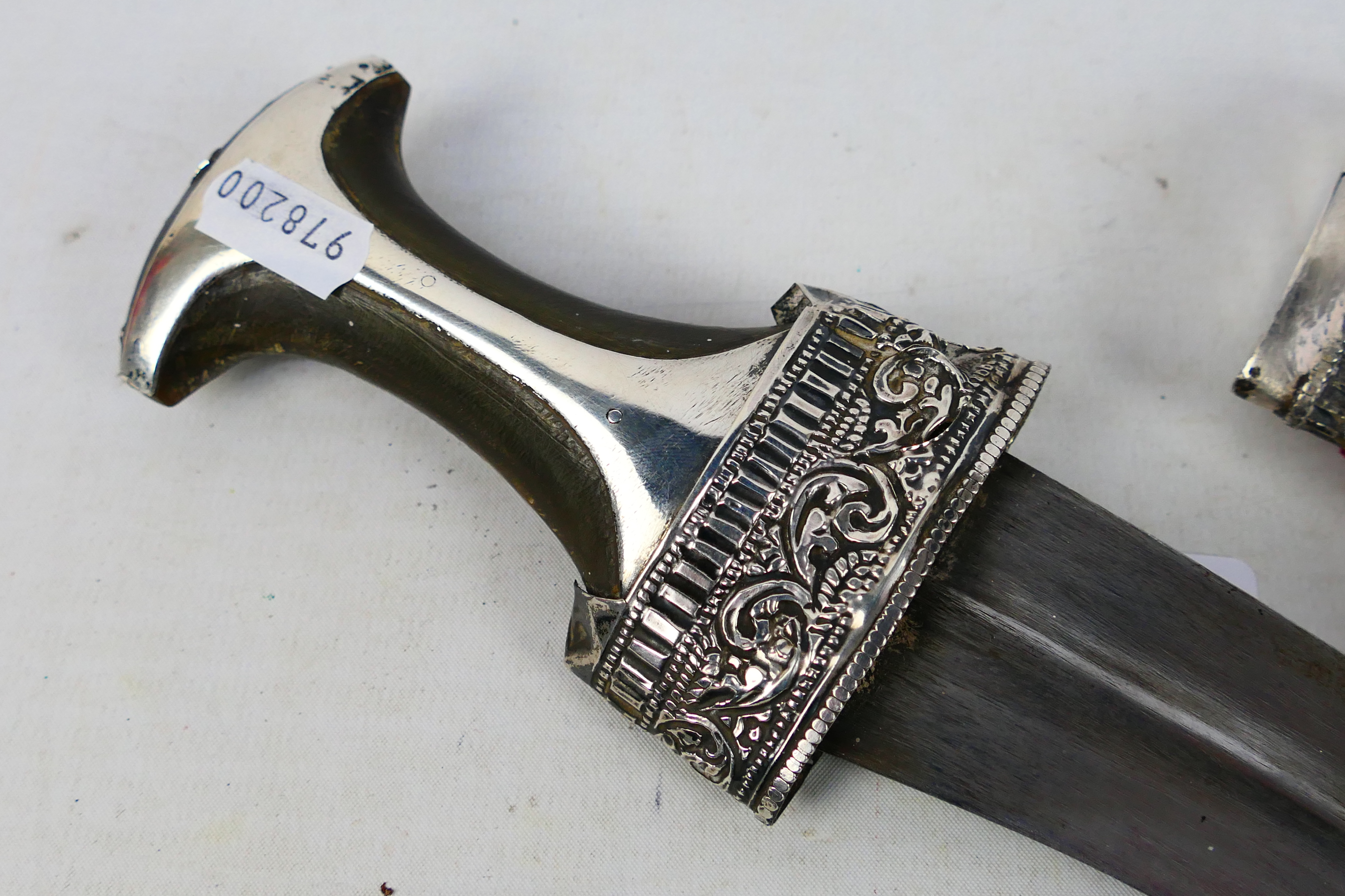 An early 20th century white metal mounted jambiya dagger and scabbard, - Image 2 of 7