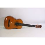 A BM Clasico Spanish made acoustic guitar. Appears in good condition.