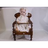 A bisque headed German doll impressed AS Germany 268/9 to rear of head,