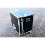 A medium sized professional flight case, raised on castors, approximately 75 cm x 74.5 cm x 52.5 cm.