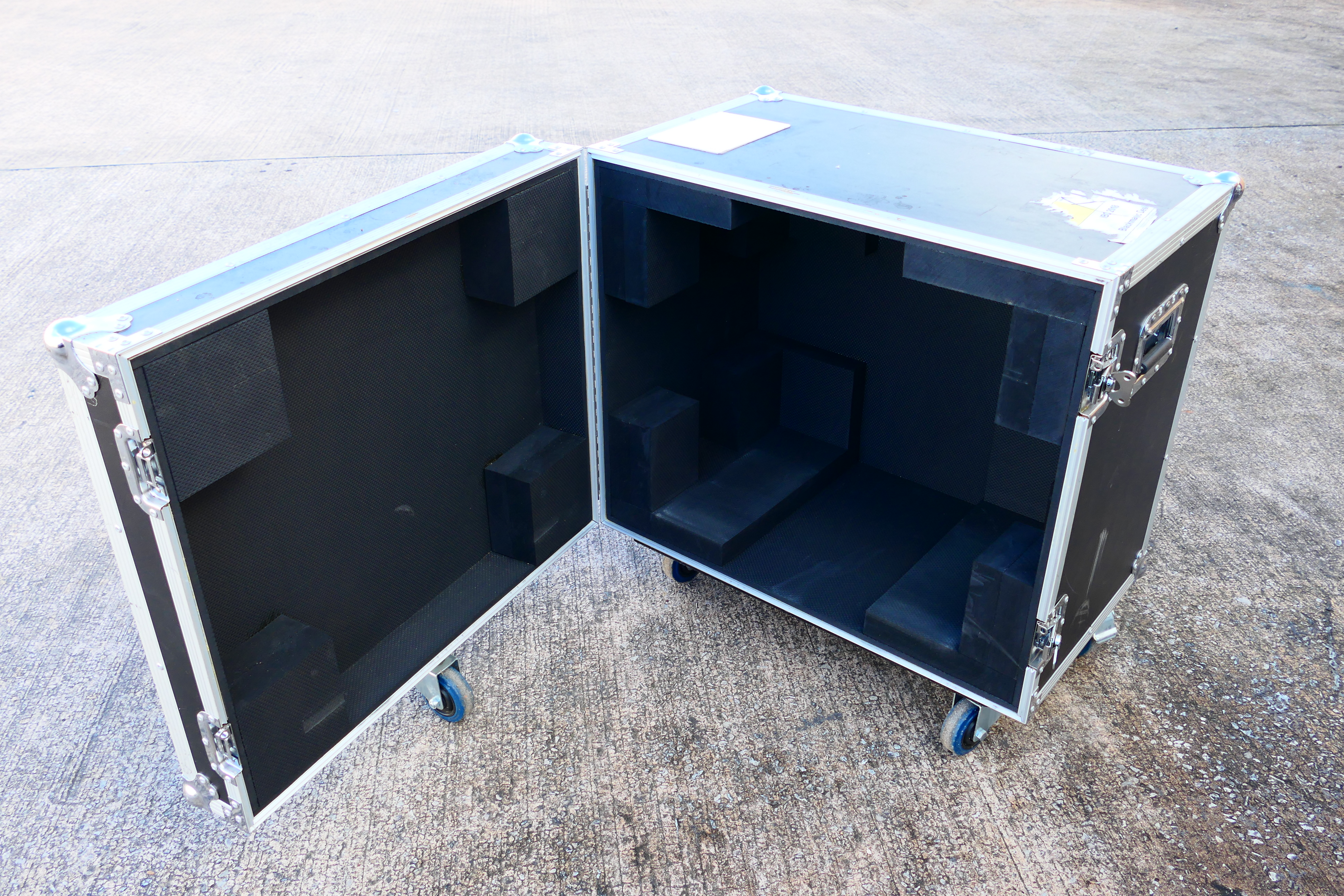 A medium sized professional flight case, raised on castors, approximately 75 cm x 74.5 cm x 52.5 cm. - Image 5 of 5