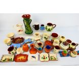 A collection of Torquay pottery wares to