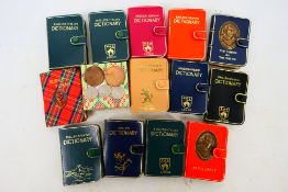 A collection of miniature books to include dictionaries, Shakespeare,