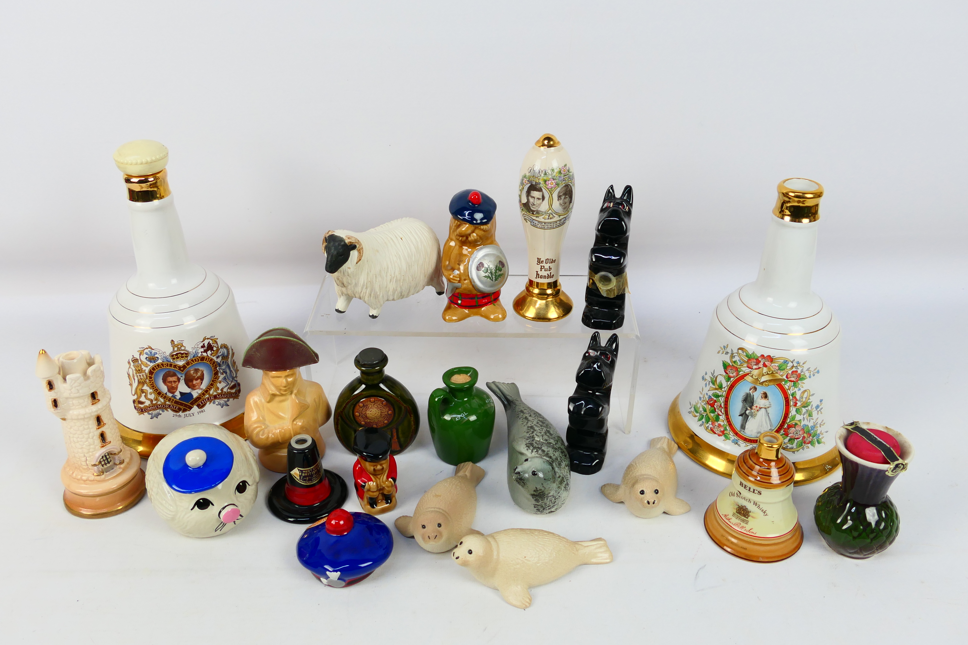 A group of novelty whisky decanters (all