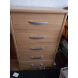 A slim chest of five drawers measuring approximately 91 cm x 55 cm x 40 cm.