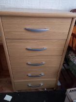 A slim chest of five drawers measuring approximately 91 cm x 55 cm x 40 cm.