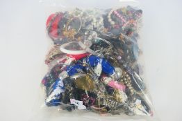 Costume Jewellery - A sealed bag containing approximately 3.