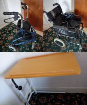 An adjustable over-bed table on castors, a three wheeled mobility walker and a wheelchair.
