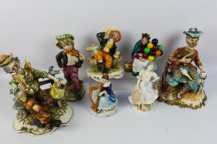 A collection of ceramic figures to include a Royal Worcester limited edition The Milkmaid,