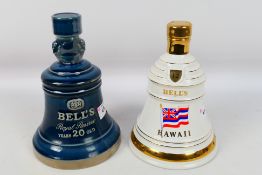 Bells - Two Wade decanters, with content