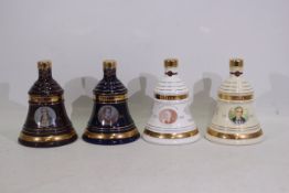 Bells - Four Wade decanters, with conten