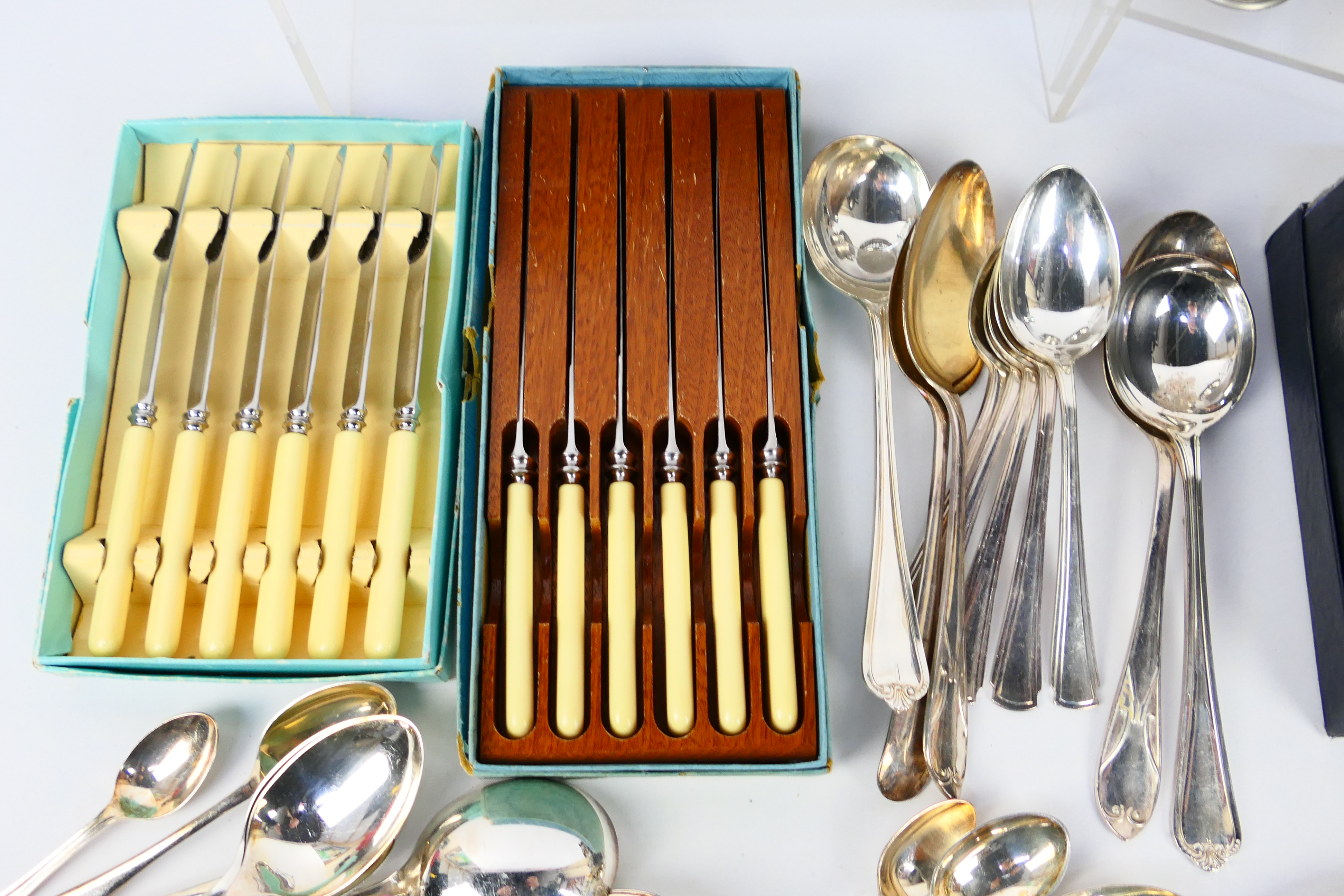 A collection of various plated ware, stainless and other including flatware. - Image 2 of 7