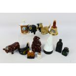 A group of miniature novelty decanters i