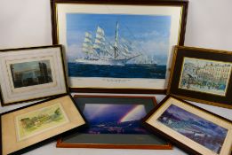 A collection of framed prints to include