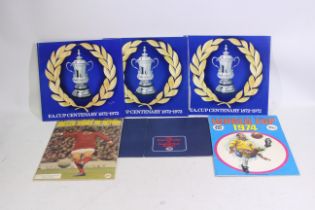 Football coins and stamp album pictures