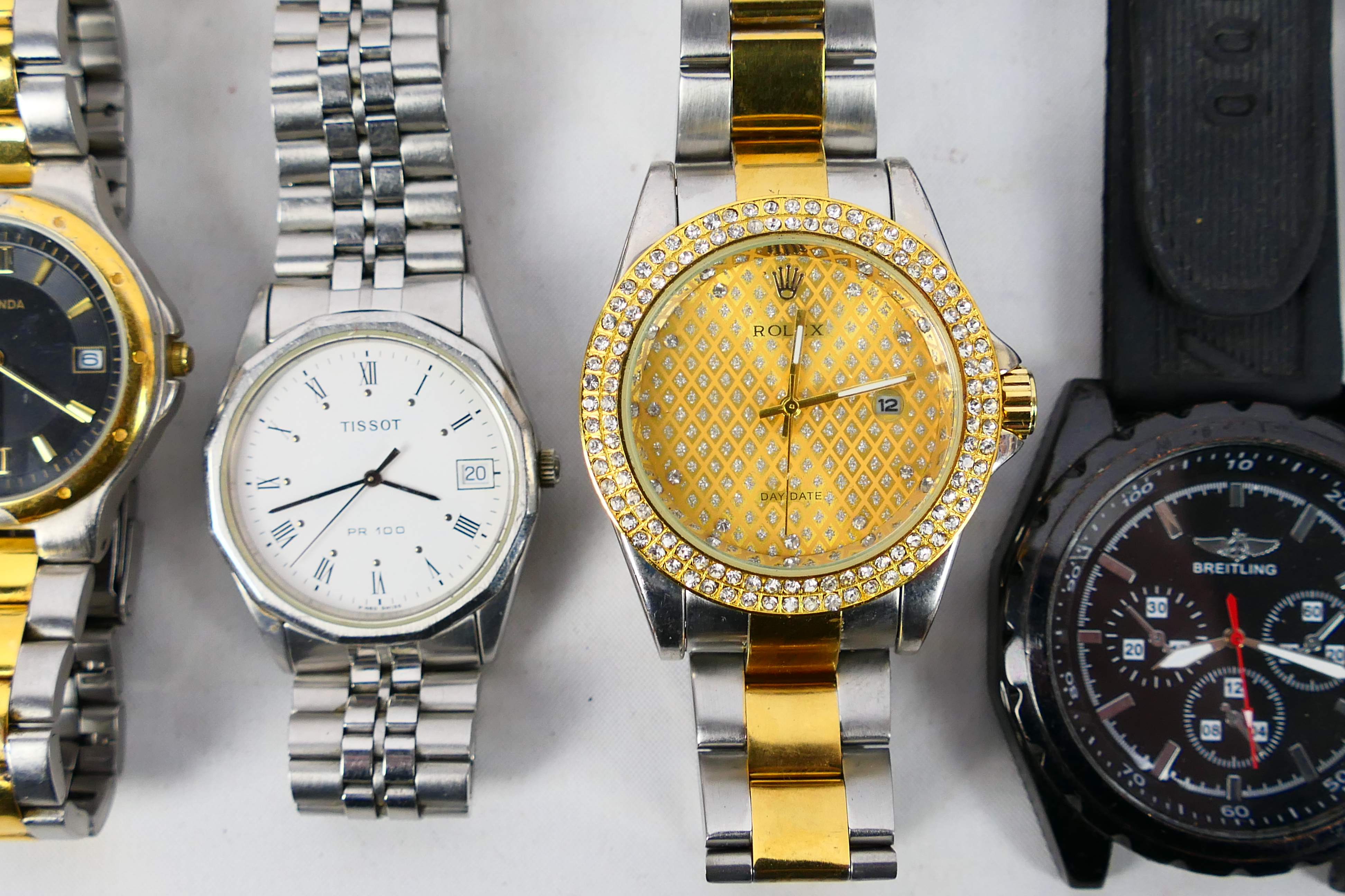 A collection of men's and women's watches to include Sekonda, Tissot, Citizen, and similar. - Image 6 of 17