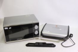 Morphy Richards, George Foreman - A George Foreman model 19932 grill. A Morphy Richards microwave.