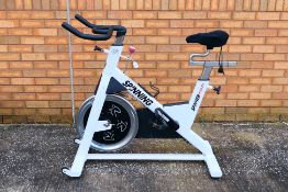 A Mad Dogg Athletics Spinning exercise bike.