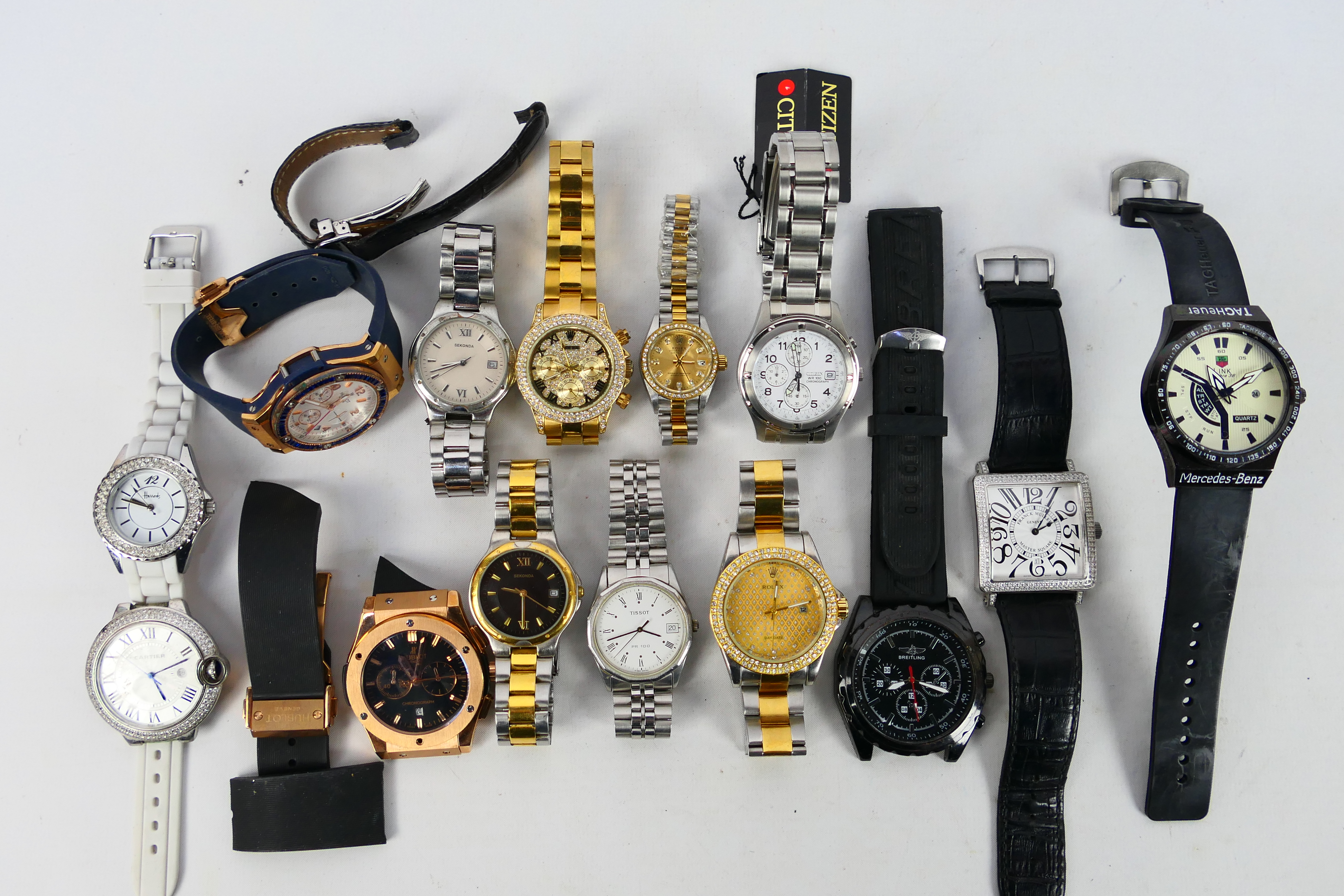 A collection of men's and women's watches to include Sekonda, Tissot, Citizen, and similar.